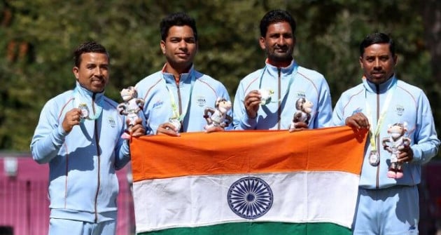 Silver medalists Sunil Bahadur, Navneet Singh, Chandan Kumar Singh (second from right), and Dinesh Kumar of India pose during Men