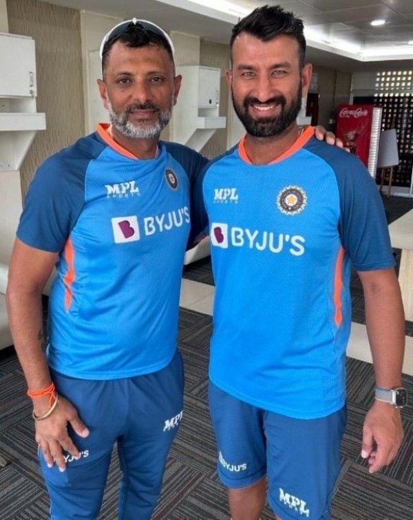 Sitanshu Kotak with Cheteshwar Pujara (right) when he became the coach of India A