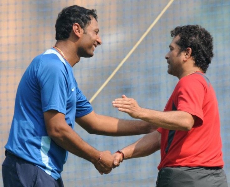 Sitanshu Kotak with Sachin Tendulkar (right)