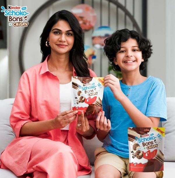Sneha Reddy (left) in an advertisement for Kinder Schoko Bons Crispy chocolate