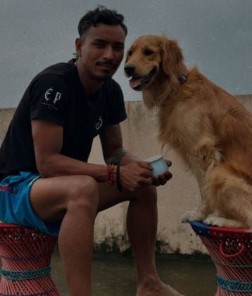Sompal Kami with his pet dog