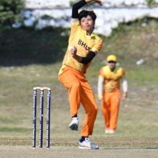 Sonam Yeshey bowling in a T20I match
