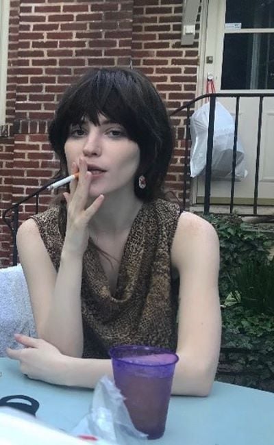Sophie Thatcher smoking a cigarette