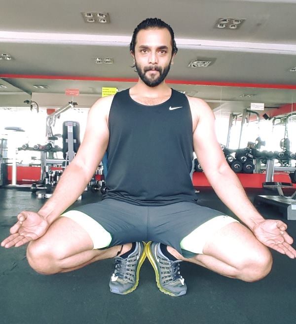 Sriimurali exercising in a gym