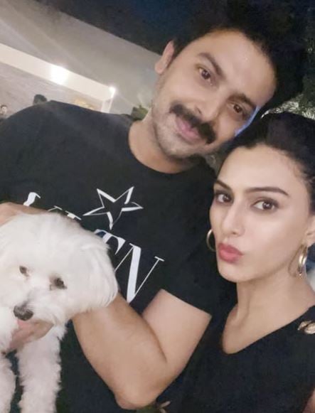 Srikanth and Vandana with their pet dog