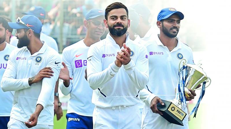 Srikar Bharat with the Indian team test captain Virat Kohli after the Bangladesh series
