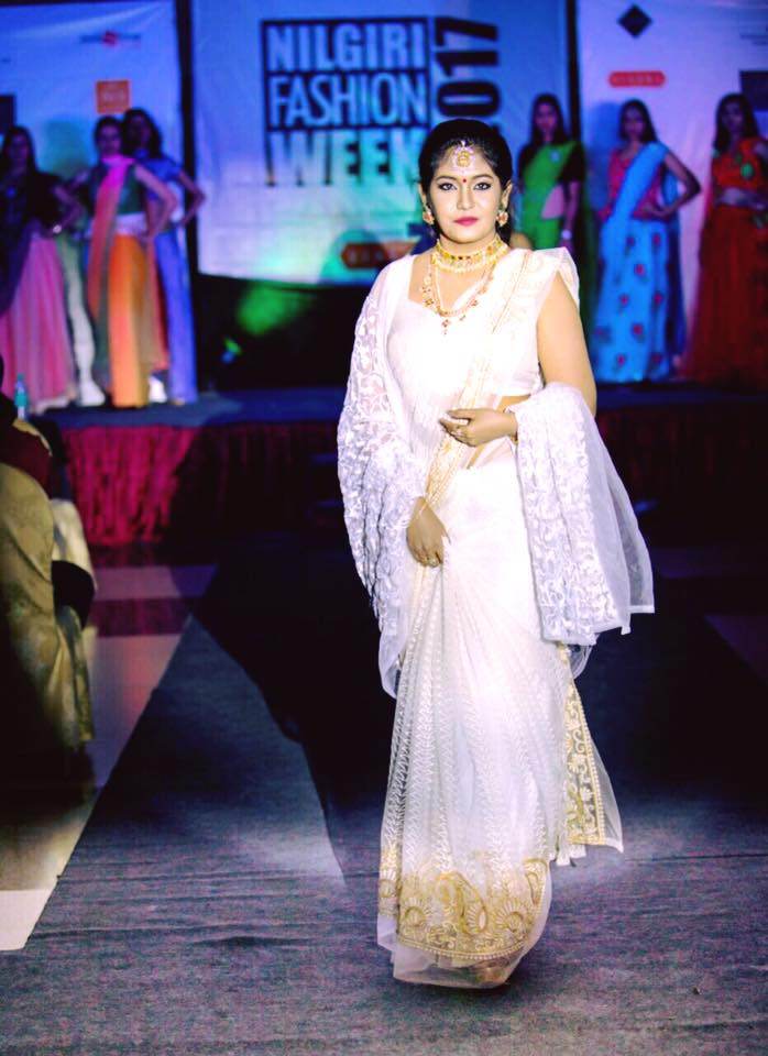 Sruthi Shanmuga Priya walking on ramp during a fashion show