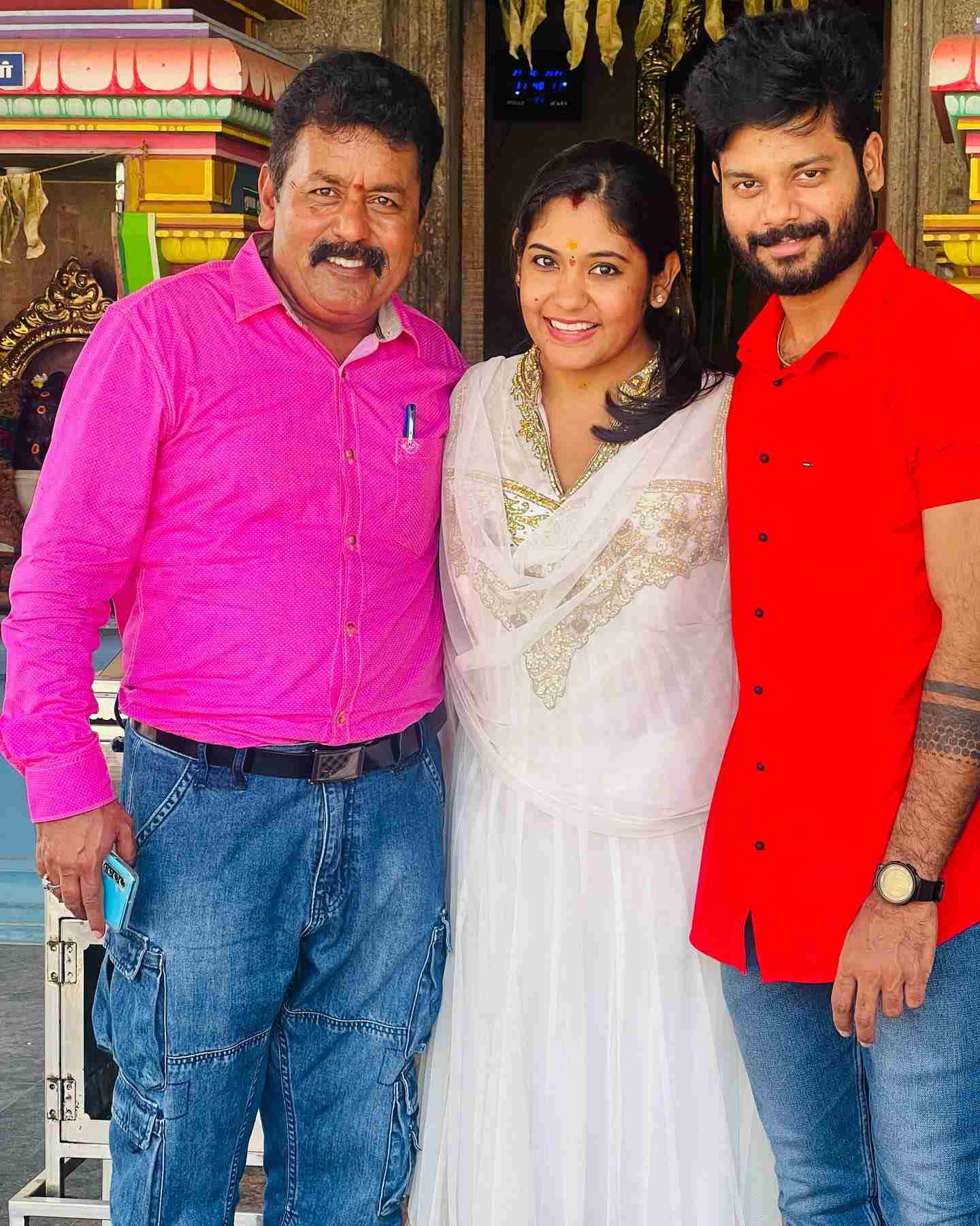 Sruthi Shanmuga Priya with her husband, Arvind Shekar (right) and father, Ravichandran