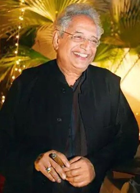 Sudhir Kakar holding a cigar