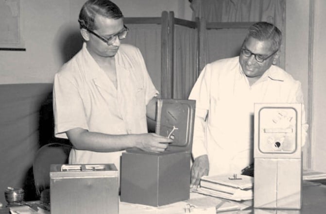 Sukumar Sen, Chief Election Commissioner, and P.S. Subramaniam, Secretary to the Commission, while examining some supplies of ballot boxes designed for use in India’s massive elections