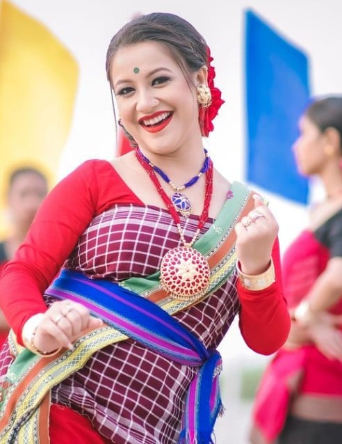 Sumi Borah while performing traditional Assamese dance form