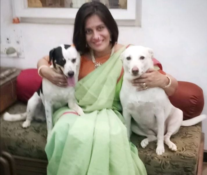 Sumukhi Pendse with her pet dogs