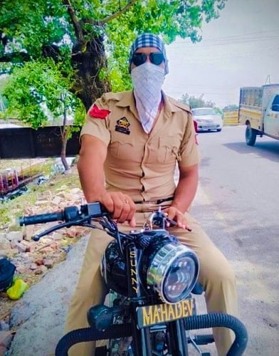 Sunil Kumar in police uniform