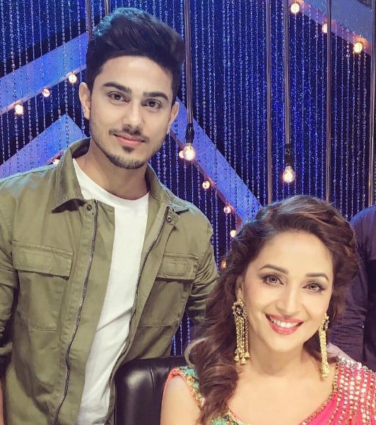 Sunny Chopra posing with Madhuri Dixit on the sets of the dance reality show So You Think You Can Dance (2016)