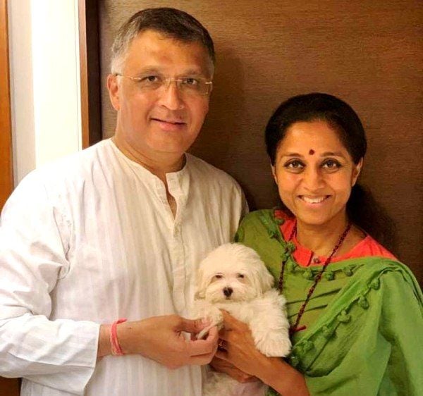 Supriya Sule with her husband Sadanand Sule and their dog Luka
