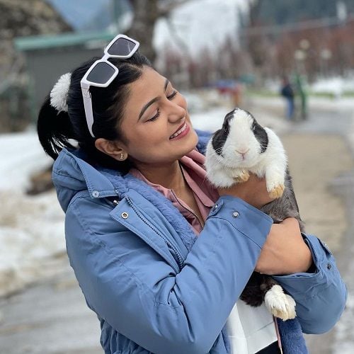 Surbhi Rathore with a rabbit
