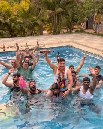 Surendra Patil, while enjoying a pool party with his friends