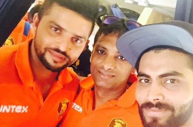 Suresh Raina, Sitanshu Kotak, and Ravindra Jadeja (left to right) when he was the coach of Gujarat Lions