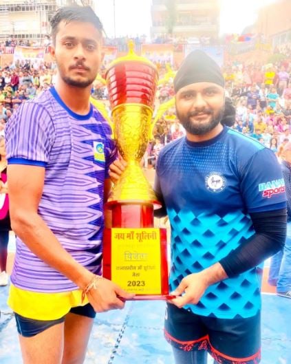 Surinder Singh (right) playing in a local Kabaddi Tournament