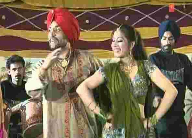 Surjit Bindrakhia (left) in a still from his song titled