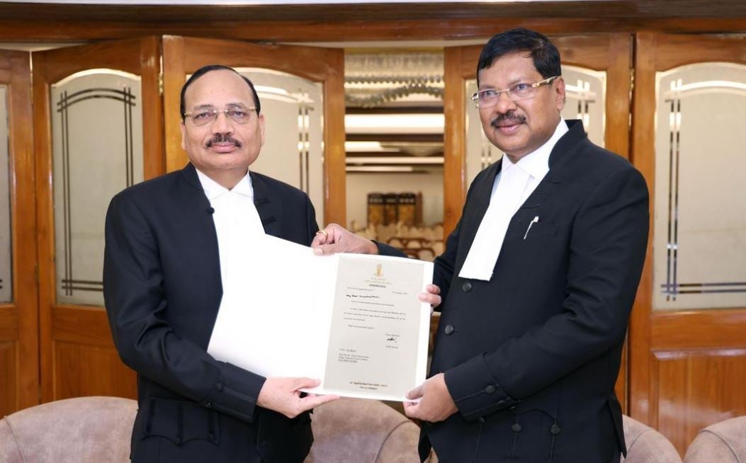 Justice Surya Kant (left) with Chief Justice of India BR Gavai (right)