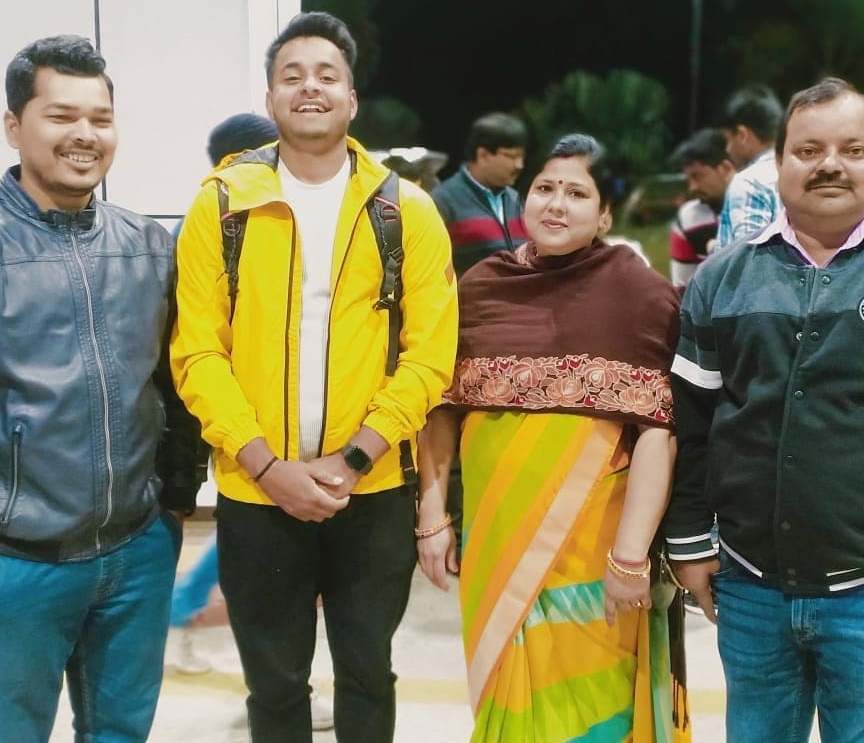 Sushant Mishra (in yellow jacket) with his coach, Satyam Roy (extreme left) and parents