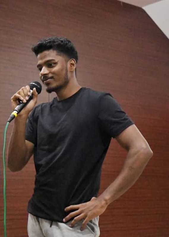 Sushant Waydande while giving a talk on football in a school
