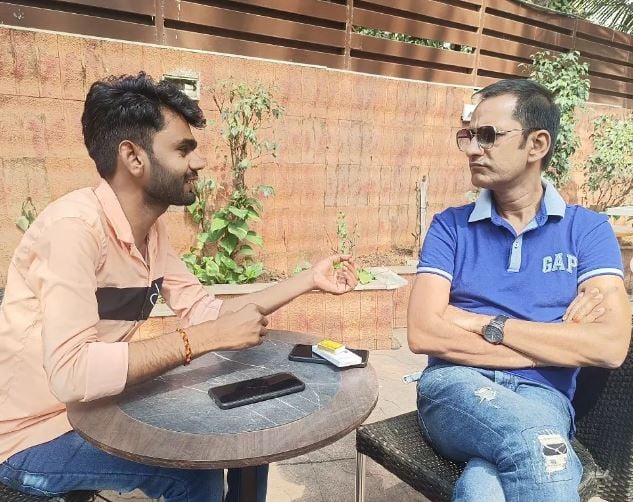 Sushil Pandey with a Cigarette Box