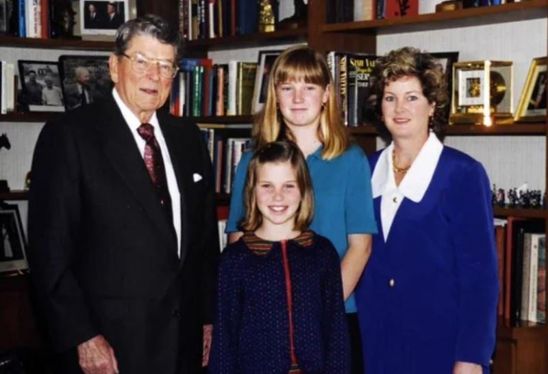 Susie Wiles and her daughters with Ronald Reagan at his office in March 1998