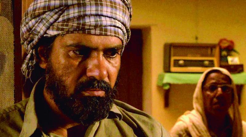 Suvinder Vicky as Joginder Singh in a still from the Punjabi film Chauthi Koot (2015)