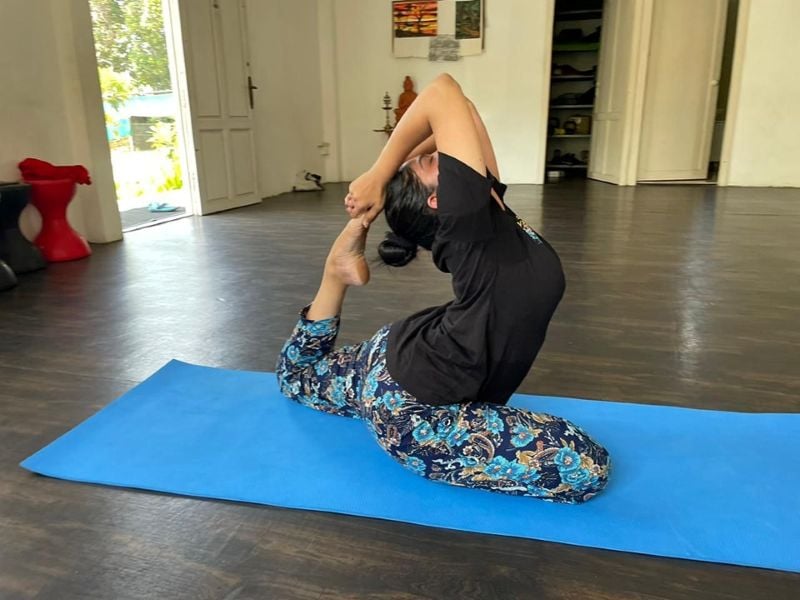 Swasika practicing yoga