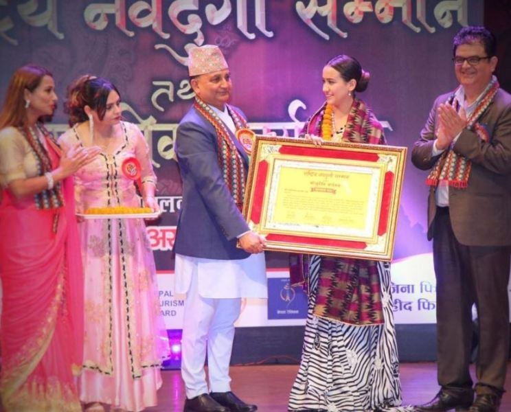 Swastima Khadka while receiving Navdurga Samman in 2019