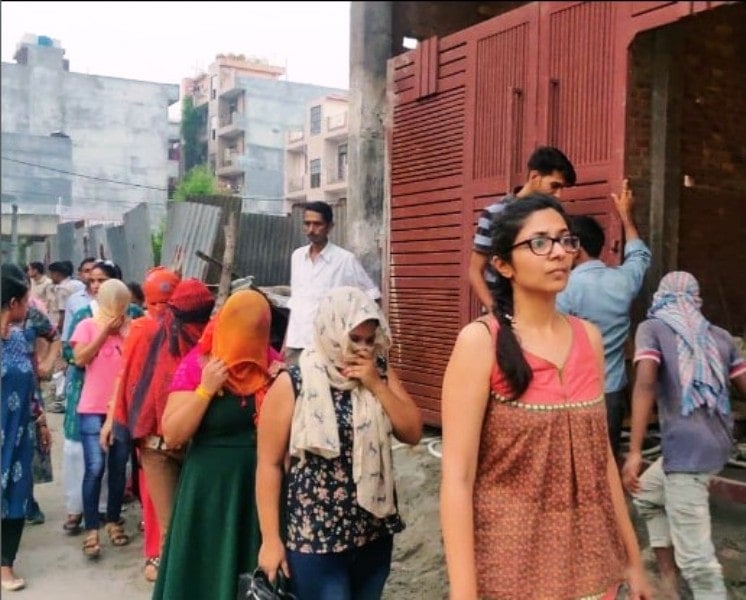 Swati Maliwal with the arrested workers of a spa in Delhi