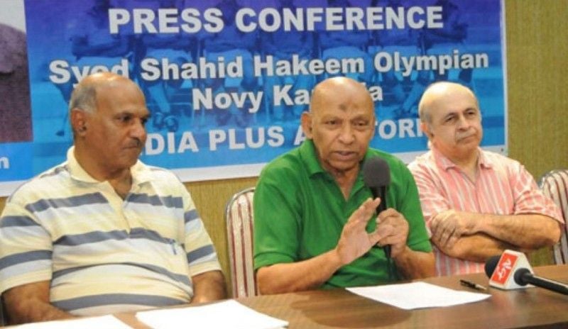 Syed Shahid Hakim (centre) during a program as the chairperson of the football council