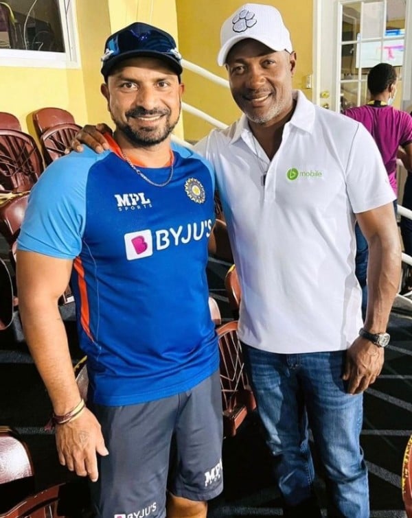 T Dilip with Brian Lara (right) during a training session