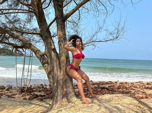T Komal at a beach