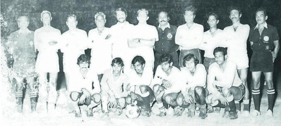 T. Abdul Rahman (standing, second from right) during a league match