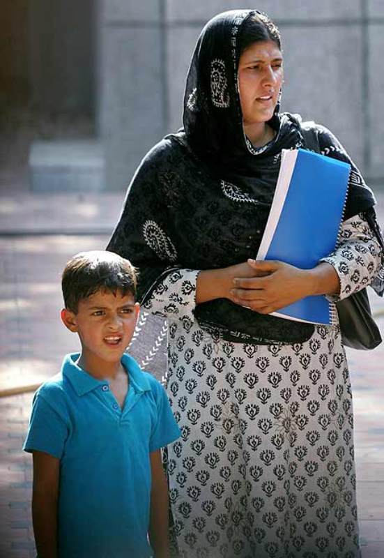 Ghalib Guru, along with his mother, Tabassum Guru, waiting inside the Central jail to meet his father
