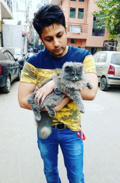 Tabish Husain with his pet cat