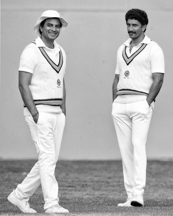 Tahir Raj Bhasin (as Sunil Gavaskar), along with Ranveer Singh (as Kapil Dev), in a still from the film 