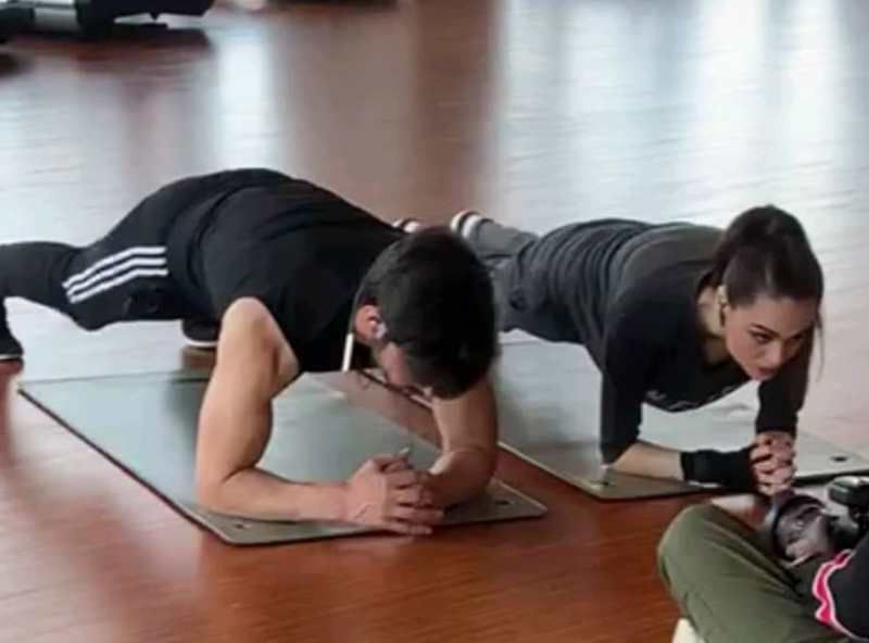 Tahmina Javed (right) while working out in a gym