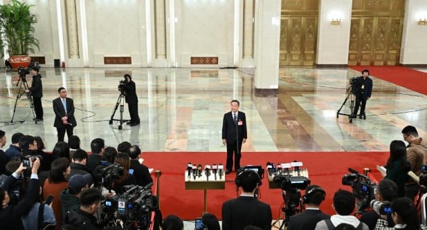 Tang Renjian while speaking to the media after the opening meeting of the second session of the 14th NPC at the Great Hall of the People in Beijing, China, on 5 March 2024