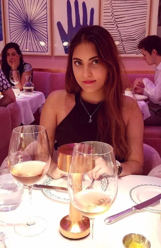 Tannaz Davoodi while consuming alcohol