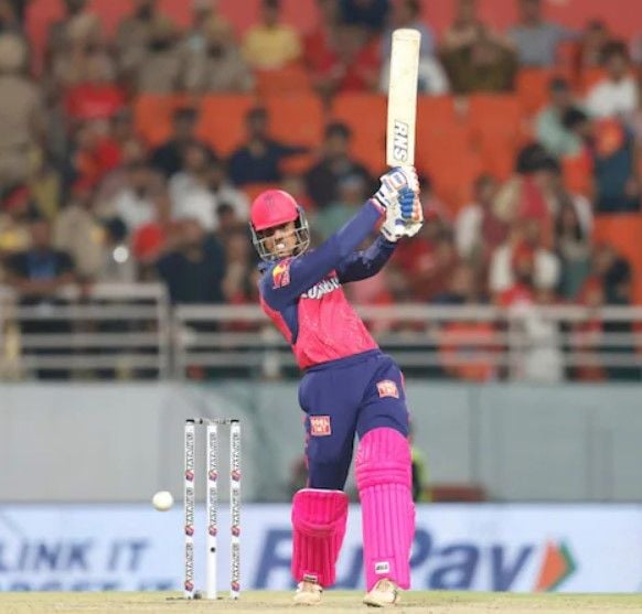Tanush Kotian batting during his IPL debut