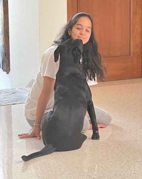 Tanvi playing with her dog Lea