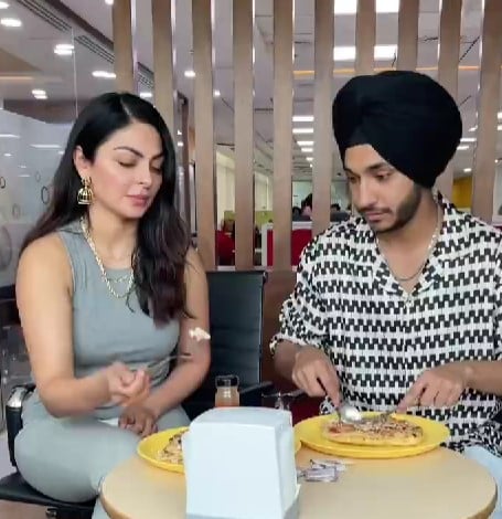 Taran Singh in a still from a reel with Neeru Bajwa