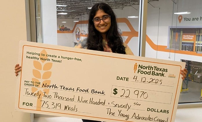 Tejasvi Manoj after collecting a donation to support the North Food Bank with her team to provide over 75,000 meals to the community