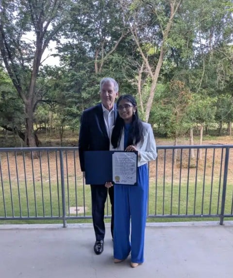 Tejasvi Manoj after receiving a TIME