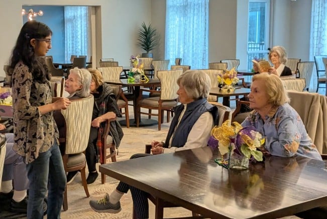 Tejasvi Manoj hosting a 