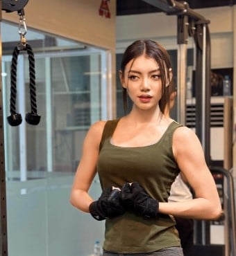 Thae Su Nyein while posing at a gym